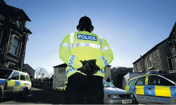  ??  ?? &gt; The Home Affairs Select Committee has warned the Government that police cuts are a threat to safety, justice, community cohesion and public confidence