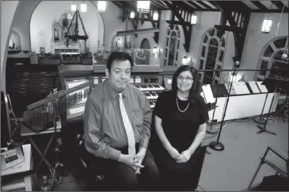  ?? The Sentinel-Record/Mara Kuhn ?? ONE YEAR: Rick Warren, principal organist and pianist, left, and Sheree O’Rorke, director of music, have served one year at St. Mary of the Springs Catholic Church.