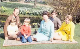  ?? Photos / Reginald Davis, Shuttersto­ck; Getty Images ?? Prince Philip and the Queen with their children Andrew, Edward, Charles and Anne at Windsor, and left, on their wedding day.
