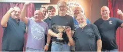  ??  ?? Players from Halton Stadium celebrate winning the Widnes Bowling Club Cup.