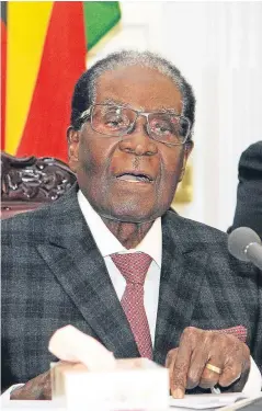  ?? Picture: AP. ?? Robert Mugabe was expected to resign last night but ended his live address still clinging on.