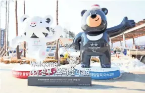  ??  ?? Soohorang the white tiger and Bandabi the Himalayan bear are the mascots of the Pyeongchan­g Games. SOOBUM IM/USA TODAY SPORTS