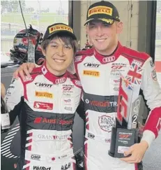  ??  ?? Frank Bird (right) with co-driver Ryuichiri Tomita at Brands Hatch