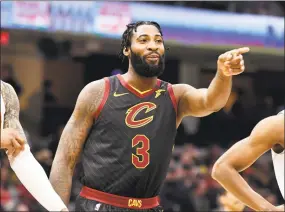  ?? Jason Miller / Getty Images ?? The Cavaliers’ Andre Drummond reacts to the Hawks bench during a Feb. 12 game.