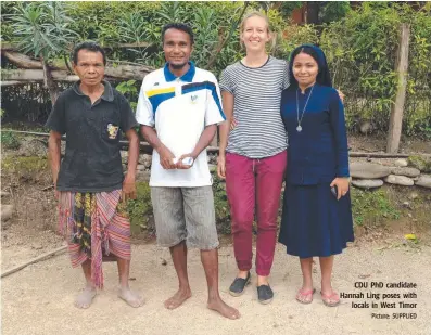  ??  ?? CDU PhD candidate Hannah Ling poses with locals in West Timor