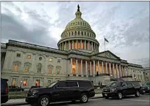  ?? JACQUELYN MARTIN / AP ?? Dusk falls over the Capitol Monday in Washington.