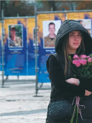  ?? / AFP ?? Una mujer participa de una exposición con motivo del Día de los Defensores de Ucrania, en Kiev, el pasado 14 de octubre.