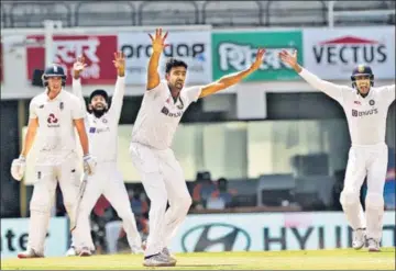  ?? BCCI ?? In a Test where R Ashwin (C) has bagged a fifer, India have lost just once—at Galle in 2015. On Monday, the off-spinner took his 28th five-wicket innings haul.