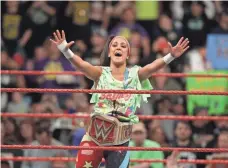  ?? WWE ?? “I still feel I’m such a fan,” says hugely popular Bayley, who is fulfilling her childhood dream.