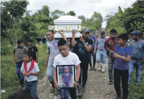  ?? AFP ?? The funeral procession for Jakelin Caal, who died in a Texas hospital after being taken into custody by US border patrol agents