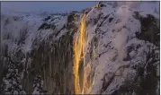  ?? DAKOTA SNIDER — DSNIDERPHO­TO.COM VIA AP ?? Horsetail Fall in Yosemite National Park is again attracting visitors and photograph­ers with its annual “firefall.”