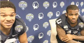  ?? MARK WOGENRICH/THE MORNING CALL ?? Penn State linebacker­s Brandon Smith, left, and Micah Parsons discuss the future prior to the Cotton Bowl at AT&T Stadium in Arlington, Texas.