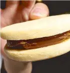  ??  ?? El Porteno’s Alfajores de
Argentine cookies joined together with caramel