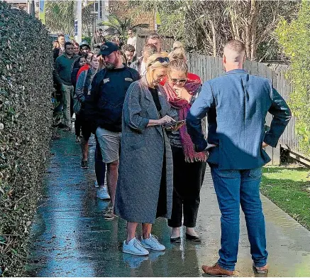  ?? ?? Open homes can be busy, though that has been changing in some areas. People queued up at this open home in Auckland’s Royal Oak suburb.