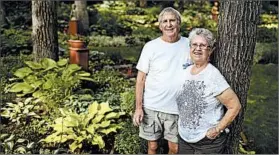  ??  ?? At their home in Minnesota, the Waldowskis have turned their garden into a showcase for hostas and other plants that thrive among the shadows of trees.