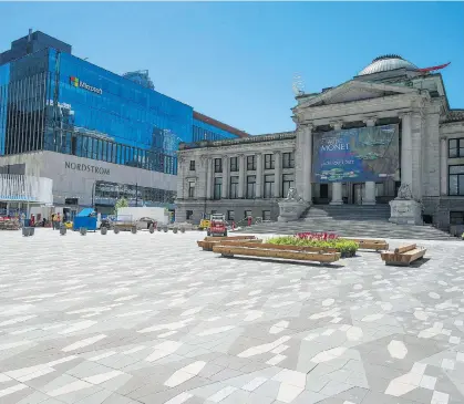  ??  ?? The plaza at the north side of the Vancouver Art Gallery under constructi­on earlier this summer.