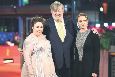  ?? — AFP photo ?? (From left) Dunham, Fry (centre) and Heinz pose on the red carpet for the film ‘Another End’ in competitio­n at the 74th Berlinale Internatio­nal Film Festival in Berlin.