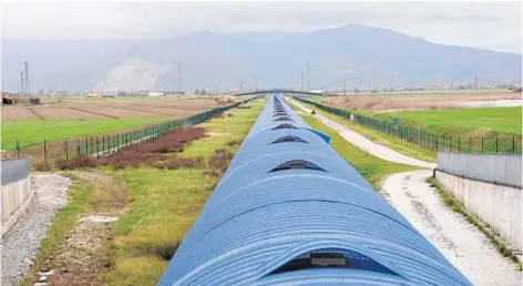  ?? CLAUDIO GIOVANNINI/AFP/GETTY IMAGES ?? Part of the detection equipment was an arm — more than a mile long — in Italy. The main discovery was made in Washington State and Louisiana.