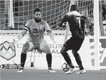  ?? [THE OKLAHOMAN ARCHIVES] ?? Oklahoma City goalkeeper Cody Laurendi (1) defends a shot attempt by San Antonio's Billy Forbes (7) during a soccer game in 2017.