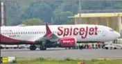  ?? HT PHOTO ?? The SpiceJet plane after an emergency landing at the Jai Prakash Narayan airport in Patna after it caught fire mid-air.