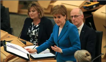 ??  ?? First Minister Nicola Sturgeon was quizzed over the provision of bus passes for the over 60s