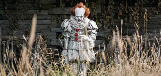  ?? Warner Bros. Pictures ?? Bill Skarsgård stars as Pennywise, the killer clown, in Stephen King’s “It,” which opens Friday.