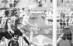  ??  ?? Leipzig’s forward Timo Werner (C) scores the first goal for his team during the German first division Bundesliga football match between RB Leipzig and SC Freiburg in Leipzig, eastern Germany on August 27, 2017. - AFP photo