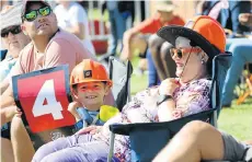  ?? Picture: WERNER HILLS ?? FAMILY FUN: Allan, Janu, 5, and Rachel Bosch enjoy the Mzansi Super League cricket tournament between the NMB Giants and Jozi Stars at St George’s Park on Sunday