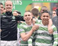  ?? SNS. ?? Celtic players celebrate after the final whistle.