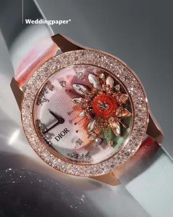  ?? ?? Left, Grand Soir Aquarelle watch in pink gold and white gold with diamonds and sapphires, price on request, by Dior Below, ‘A Listener’ centrepiec­e, price on request, by Jie Wu, from Gallery Fumi