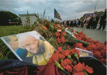  ?? DMITRI LOVETSKY/AP ?? A portrait of the late Yevgeny Prigozhin sits in an informal memorial Thursday in St. Petersburg, Russia.