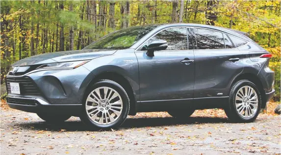  ?? PHOTOS: NADINE FILION ?? The all-hybrid 2021 Venza is no shy and retiring wagon, writes David Booth. The swooping roofline, sharp creases and bulging fenders are eye-catching and sporty.