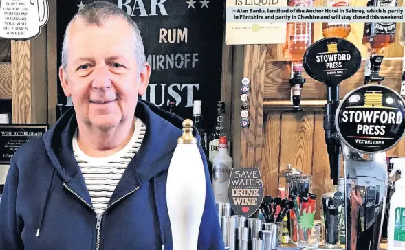  ??  ?? > Alan Banks, landlord of the Anchor Hotel in Saltney, which is partly in Flintshire and partly in Cheshire and will stay closed this weekend
