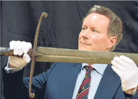  ?? Picture: Saltire News. ?? Lord Charles Bruce with the sword that belonged to his ancestor, King Robert the Bruce.