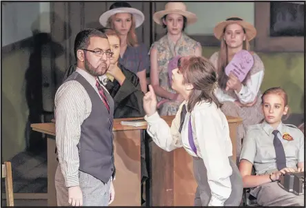  ?? PHOTOS BY JASON R. TERRELL ?? Defense attorney Helen Drummond (right) (Gabby Valasquez) challenges the beliefs of Matthew Harrison Brady (Ben Chappell) in “Inherit the Wind.”