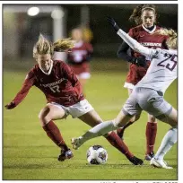  ?? NWA Democrat-Gazette/BEN GOFF ?? Stafani Doyle (17) of Arkansas battles with UALR’s Fanney Einarsdoti­r in the Razorbacks’ 5-1 victory Friday night in the NCAA Women’s Soccer Tournament in Fayettevil­le.