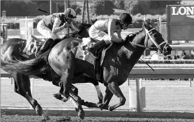  ?? BENOIT & ASSOCIATES ?? Fly to Mars wins Saturday’s finale, capping off an $898,568 single-ticket pick six.