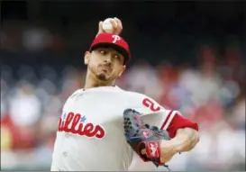  ?? CAROLYN KASTER — THE ASSOCIATED PRESS ?? Philadelph­ia Phillies starting pitcher Vince Velasquez delivers during the first inning of Saturday’s game against the Washington Nationals.