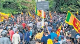  ?? AFP ?? University students take part in a demonstrat­ion demanding the resignatio­n of Sri Lanka’s President Gotabaya Rajapaksa, near the parliament building in Colombo on Friday.