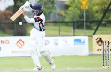  ??  ?? Jai Serong drives during a rearguaed partnershi­p with Liam Lenders in the under 16 match against Sale-Maffra.