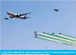  ??  ?? A Saudi falcon Hawk Mk 65 aircraft and Kuwaiti air force F-18 aircraft accompanie­d by a Kuwait Airways B777 perform during the Kuwait aviation show.