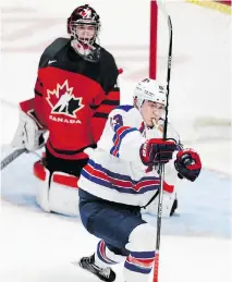  ?? ALLEN MCINNIS ?? Kieffer Bellows celebrates as Team USA ties the game during the gold medal match on Thursday.
