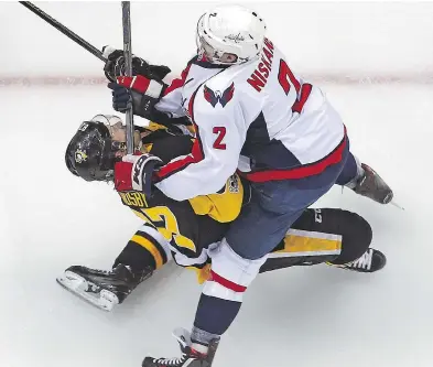  ?? GENE J. PUSKAR / THE ASSOCIATED PRESS ?? The Game 3 cross-check delivered by Washington Capitals defenceman Matt Niskanen to the face of Pittsburgh Penguins captain Sidney Crosby might have brought a premature end to the season for the game’s best player.