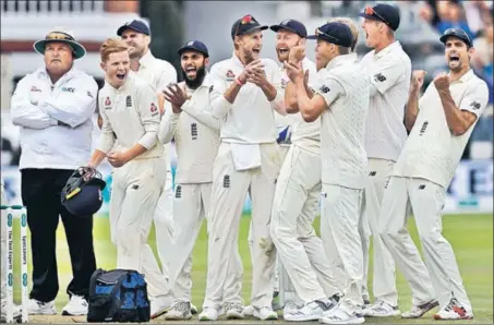  ??  ?? England look over the moon as they sent India spiralling to a humiliatin­g innings and 159run defeat in the second Test at Lord’s on Sunday.