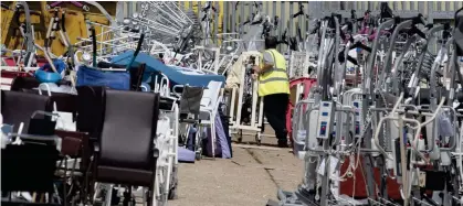  ??  ?? ‘Left to rust’: It is claimed staff shortages have led to equipment piling up at the cleaning site