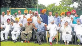  ?? HT PHOTO ?? A day after being appointed as the Punjab Congress president, Navjot Singh Sidhu meeting with party leaders at the official residence of cabinet minister Tript Rajinder Singh Bajwa in Chandigarh on Monday.