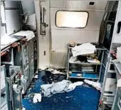  ?? FBI ?? Part of an airline cabin was in disarray after Joseph Daniel Hudek was subdued, according to a criminal complaint.