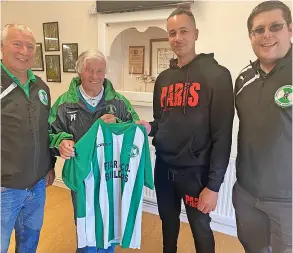  ?? ?? Peter Fear (second left) presents Tunley Athletic’s new shirt for this season to son and manager Duncan (left), Leon Worrell (second right) and chairman Craig Doughty (right)