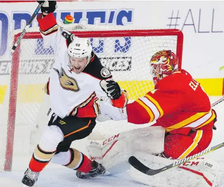  ?? AL CHAREST ?? Anaheim’s Logan Shaw celebrates his game-winning goal against Calgary goalie Brian Elliott to spoil a Flames comeback in their final home game of the regular season on Sunday at the Saddledome. The Ducks won 4-3.