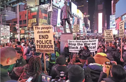  ?? MICHAEL M. SANTIAGO/GETTY IMAGES ?? A Times Square protest in January in New York City was among demonstrat­ions nationwide after police released a video of officers in Memphis, Tenn., fatally beating Tyre Nichols, 29.